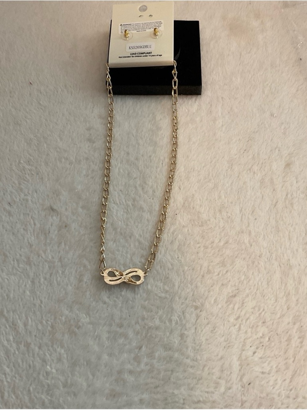 Jenni Gold-Tone Infinity Necklace with Blue Crystal Accents - Picture 5 of 5